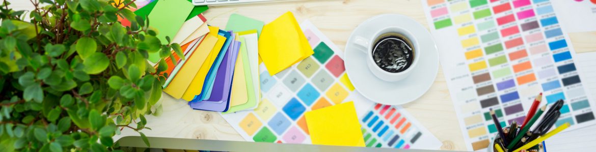 Hands of male graphic designer using computer in office